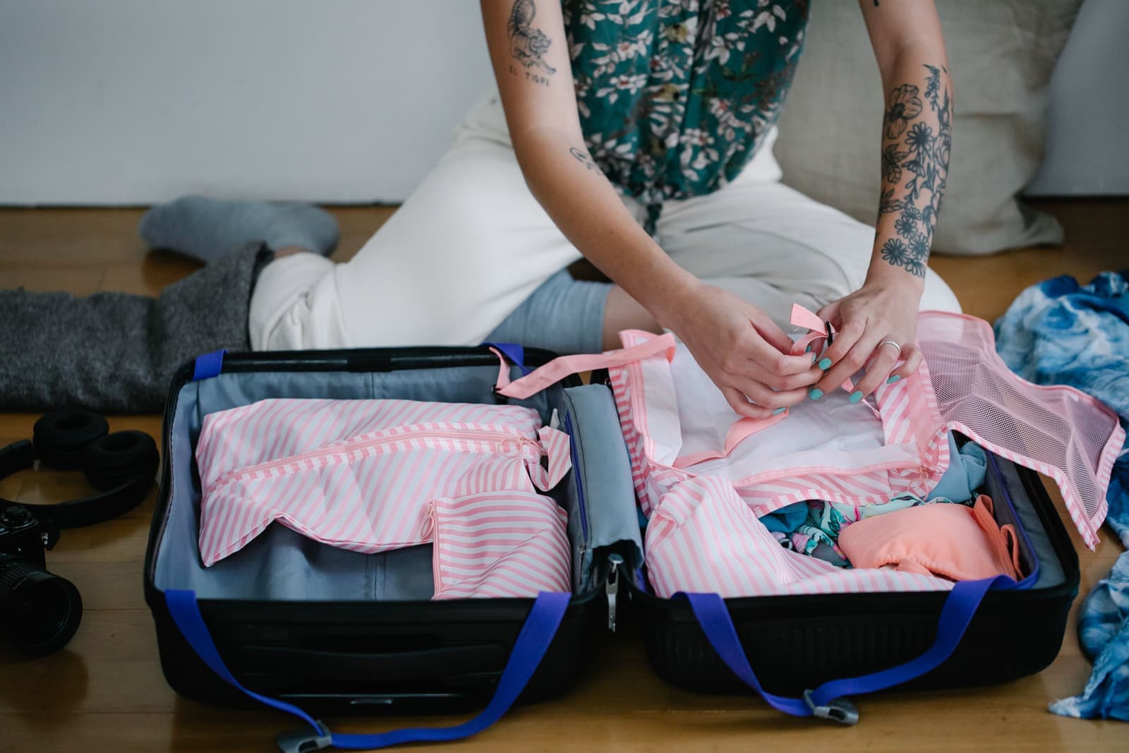 A suitcase being packed neatly for a trip